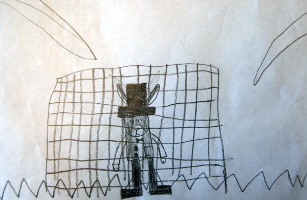 Robert in a cage.