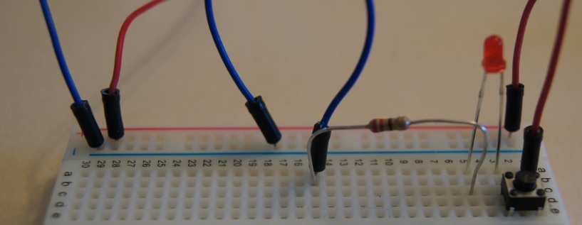 Detail of a breadboard with a LED in a circuit